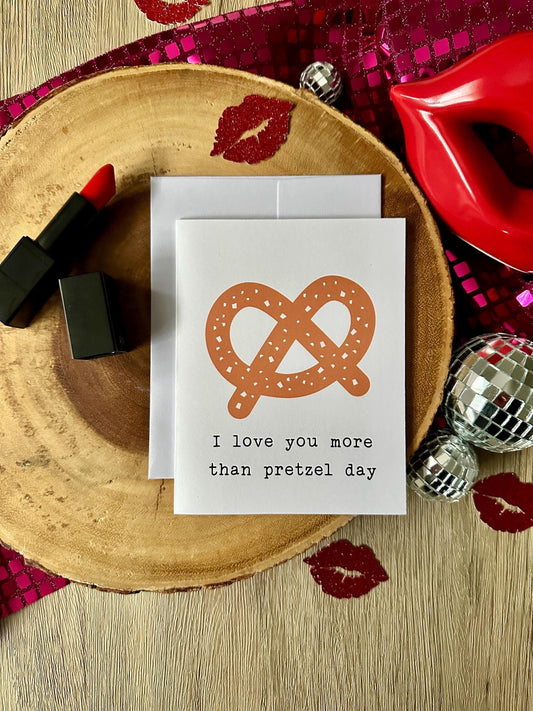 White Card with Soft pretzel and text that says i love you more than pretzel day